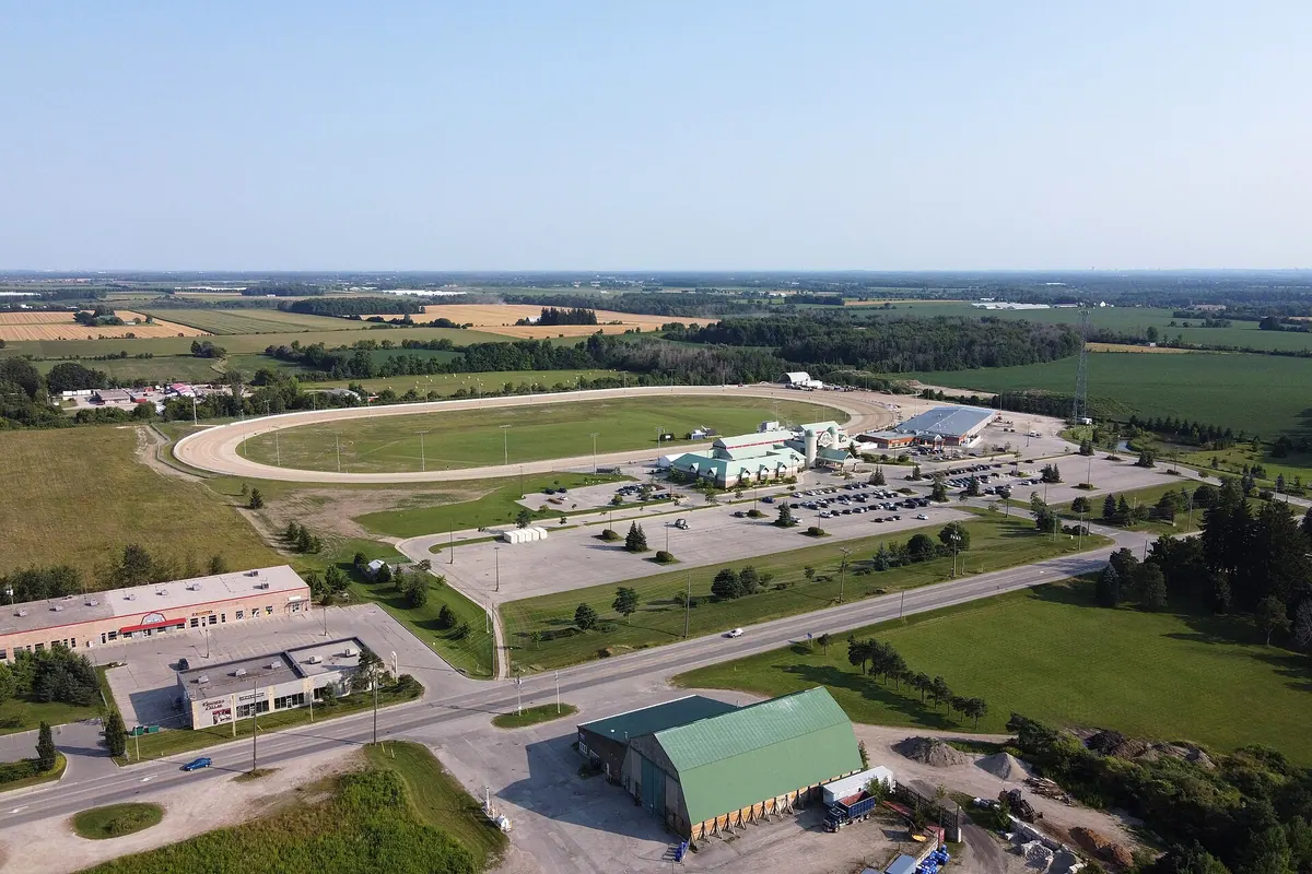 Aerial view of Grand River Raceway near Elora, with the oval track and the casino building beside it